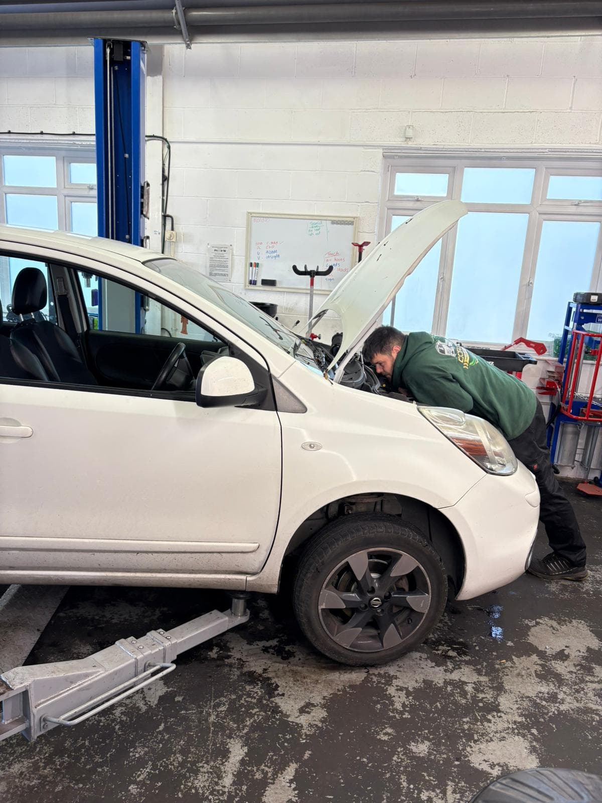Mechanic working on a car